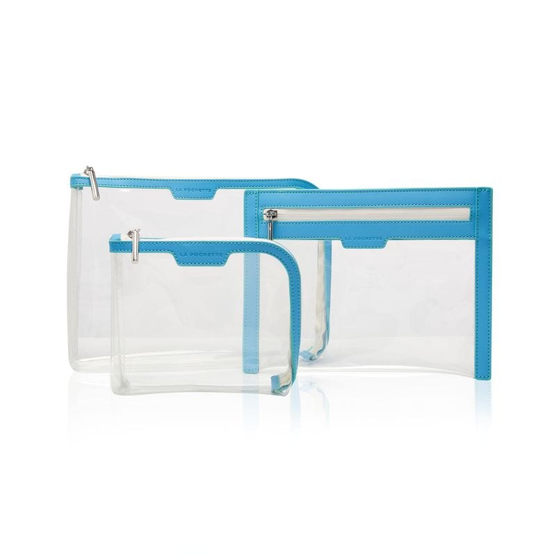 A collection of 3 cabin approved La Pochette clear travel pouches with turquoise trims and white zips. small, large pouch and wallet