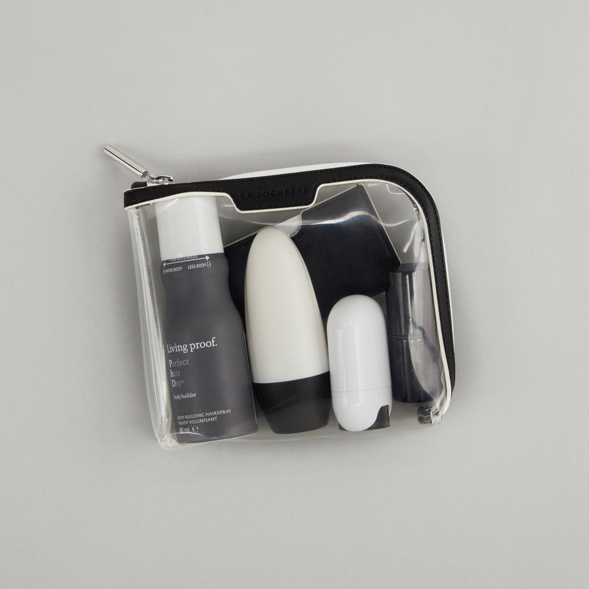 Small Anywhere Everywhere Pouch in Ink White colourway contains beauty accessories 