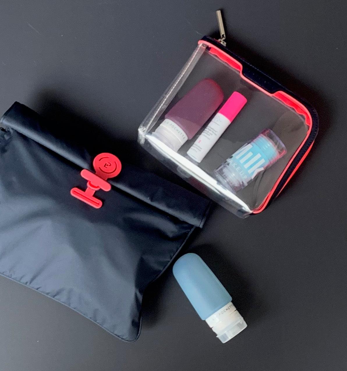 Small Anywhere Everywhere Pouch in Midnight Neon Pink colourway containing beauty accessories and La Pochette silicone travel bottle, next to Small Wet Bag in Midnight Neon Pink colourway