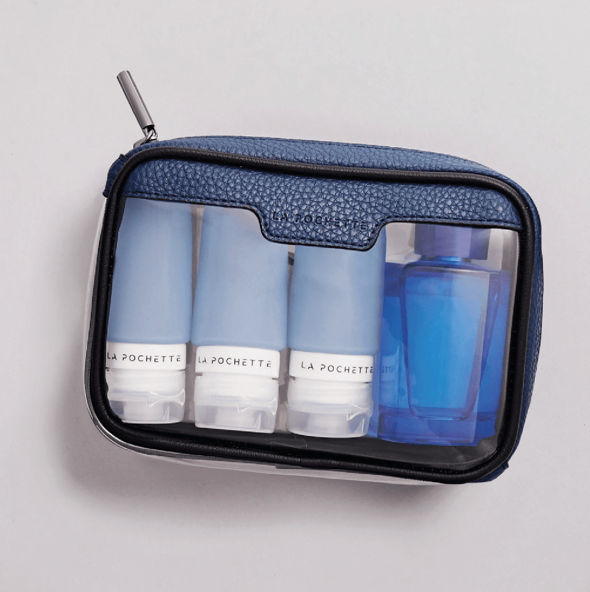 Anywhere Everywhere Box in Steel Ink colourway holding La Pochette silicone travel bottles