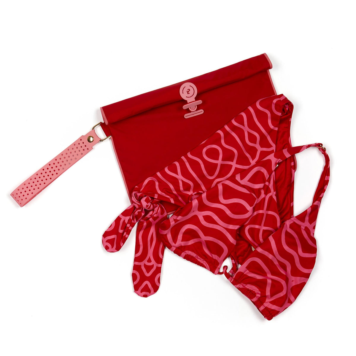 Large Wet Bag in Chilli and Peony colourway shown flat with a bikini placed on top