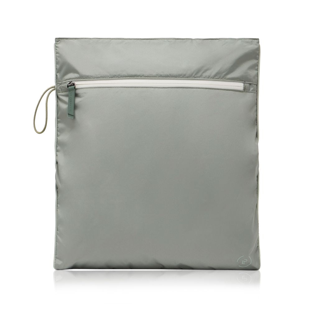 Kit Bag in sage green, with a  waterproof lining to keep sweaty kit or towels separate in your everyday bag
