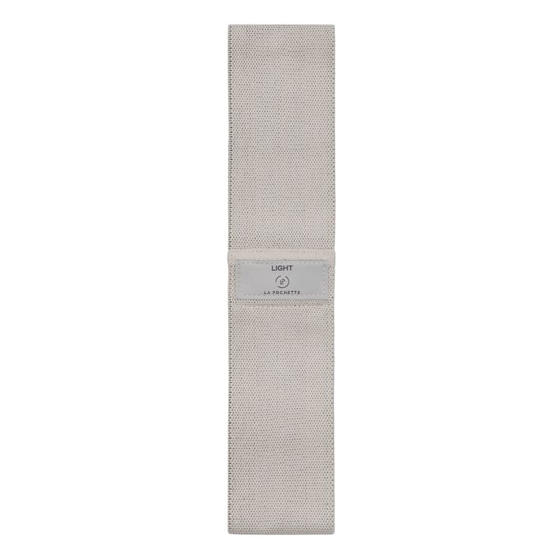 La Pochette light strength resistance band in light beige on a white background