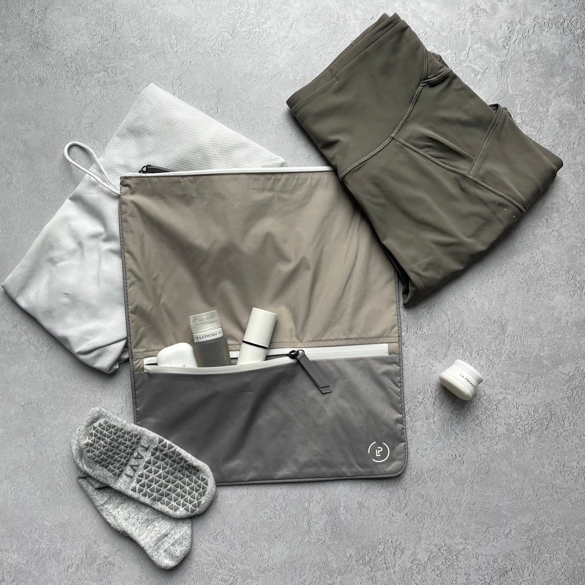 Linen Shadow Sweat bag shown with workout kit
