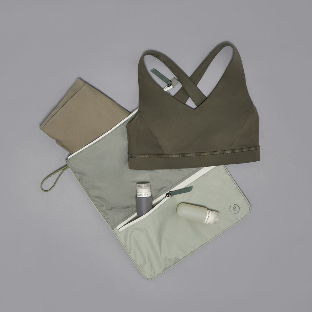 Sweat Bag shown with gym kit, and post workout essentials - lightweight bag for storing clean or dirty gym kit