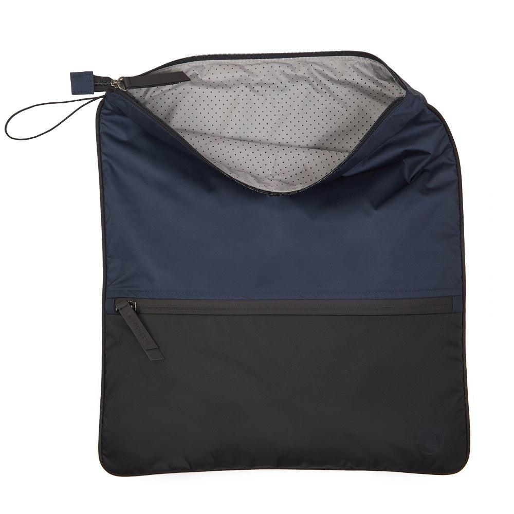 Blue La Pochette water resistant large Sweat kit bag for sport or fitness studio wear. Lightweight stylish design made sustainably from recycled material with antibacterial and deodorising properties.