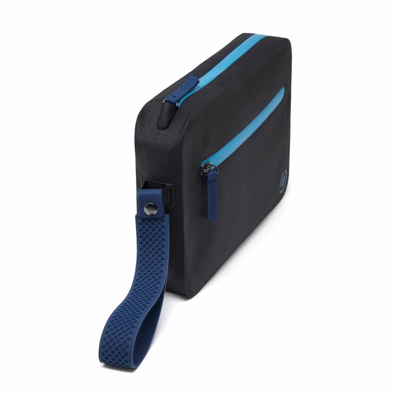 Side view of black aqua bag with bright blue waterproof zips and detachable wrist strap, showing slim profile and structure