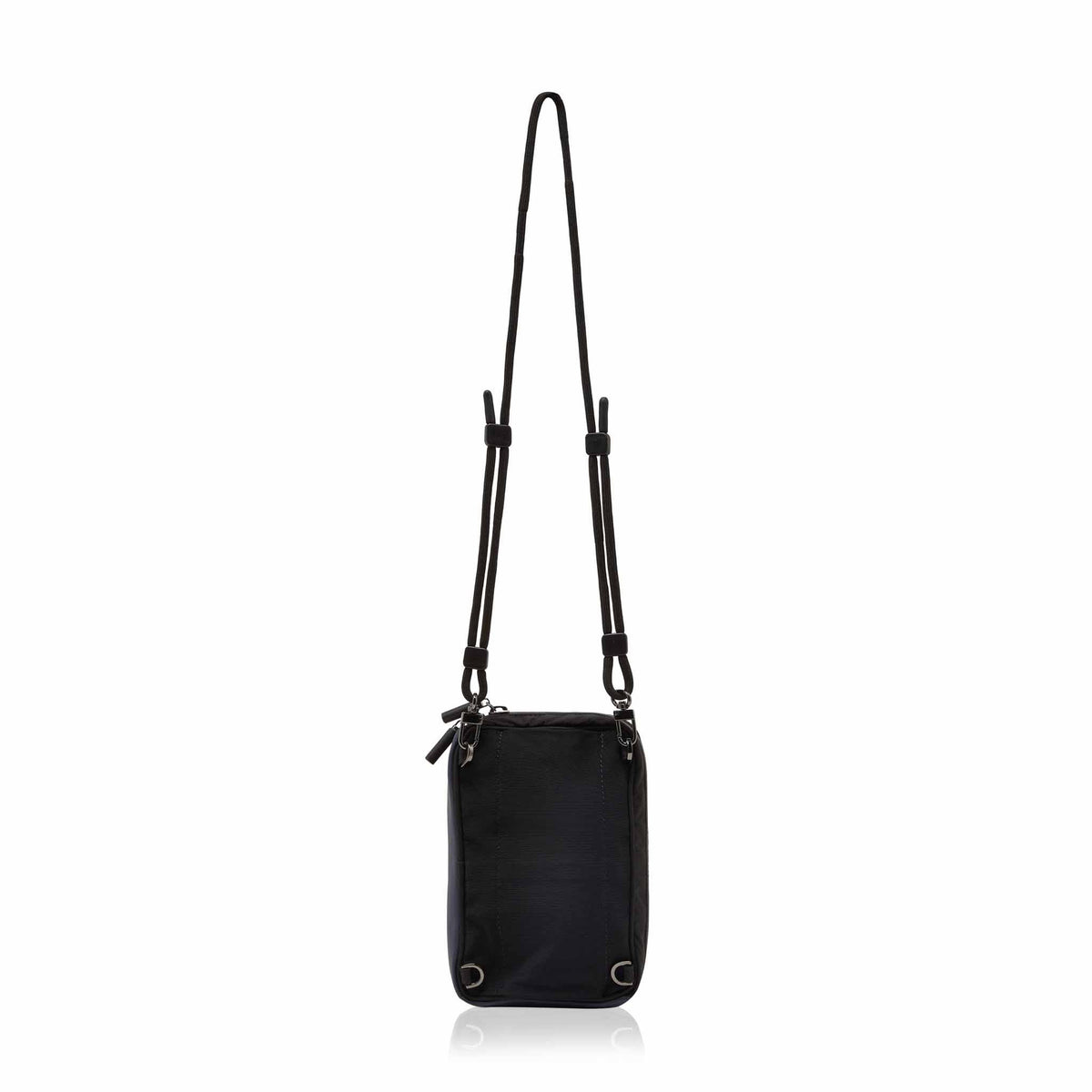 Belt bag in black shown from the back showing the strap