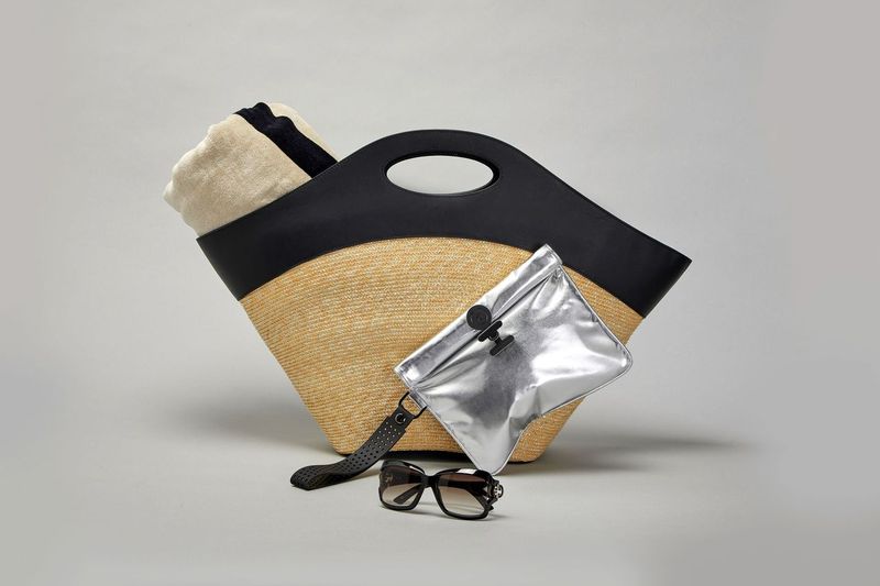 silver and ink small wet bag with basket, towel and sunglasses