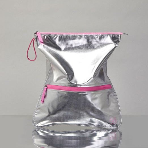 silver and pink sweat bag on silver base