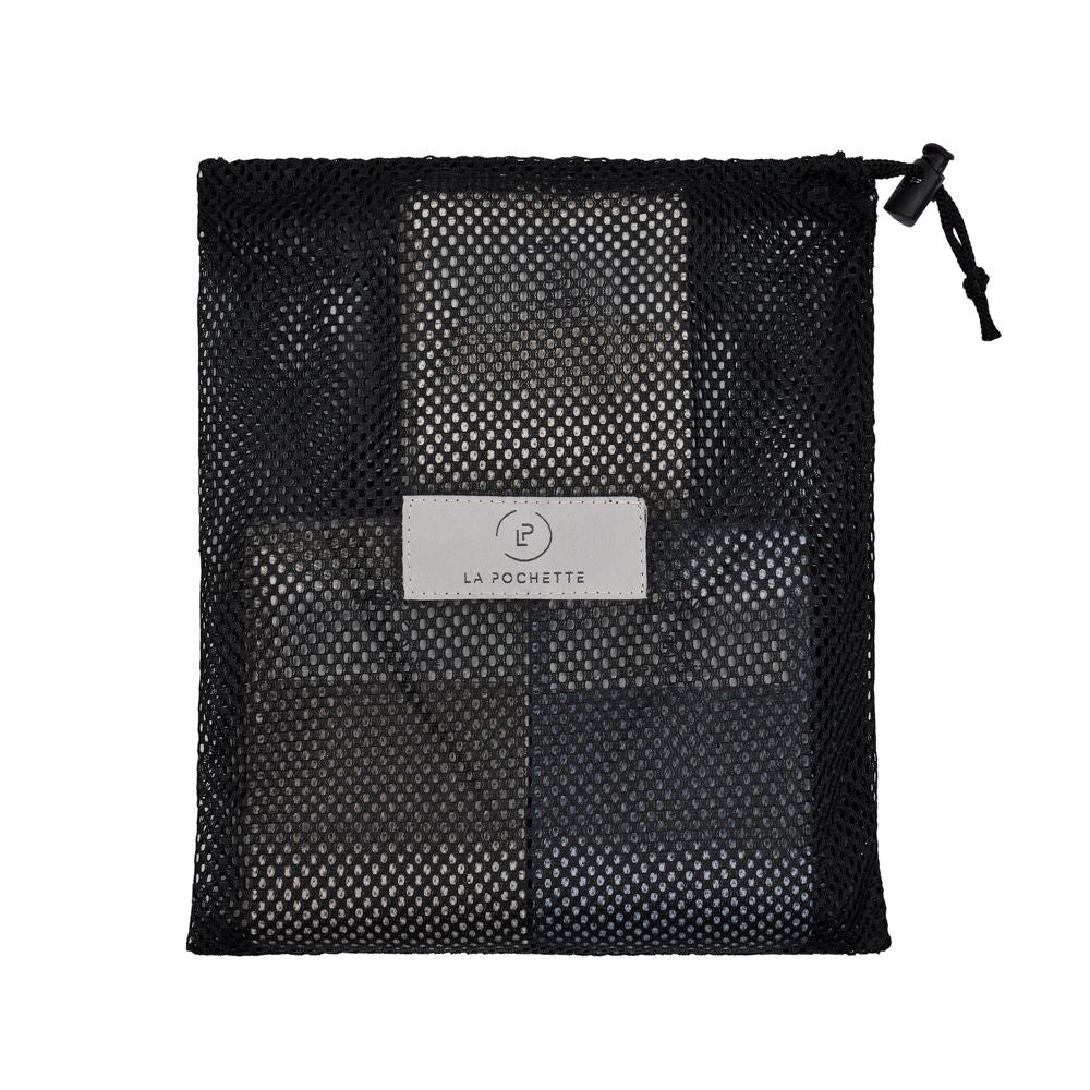 La Pochette resistance bands set of three stored in black mesh drawstring pouch showing the bands stored together