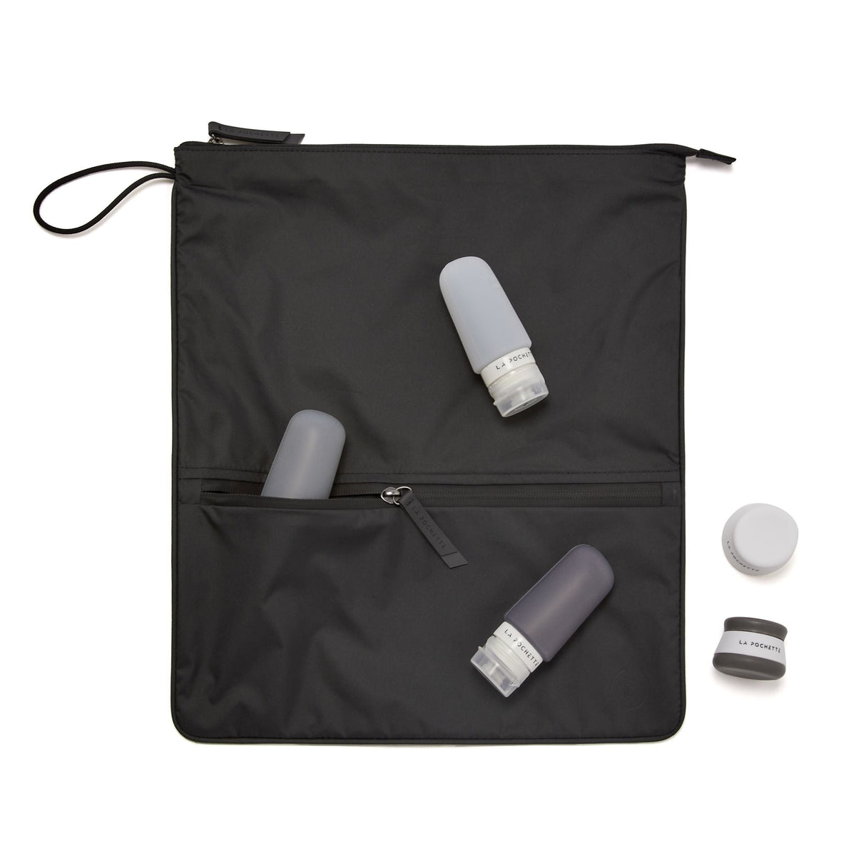 Sweat Bag in black, with a set of travel bottles and pots