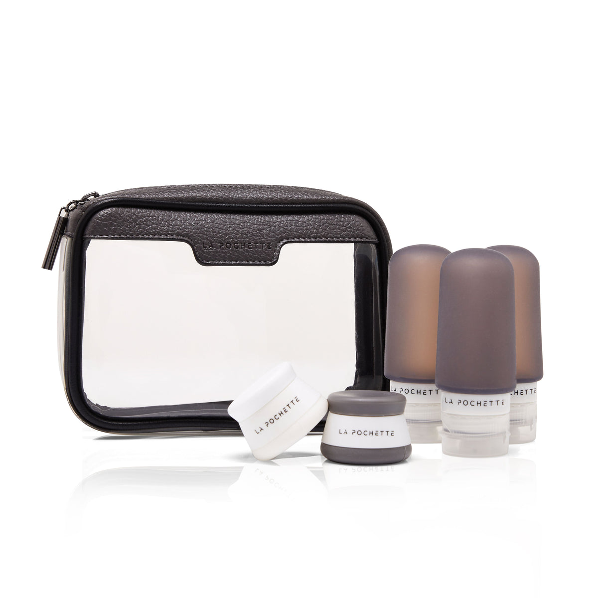 Small Anywhere Everywhere Box In Charcoal grey with a set of three charcoal travel bottles and travel pots