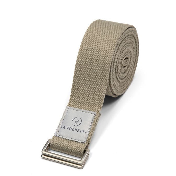 yoga strap in soft green with a metal clip on a white background
