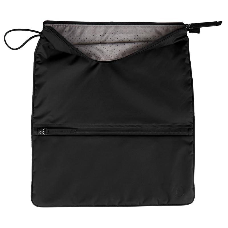 Ink Sweat Bag lying flat, showing unzipped top to reveal inner perforated grey lining