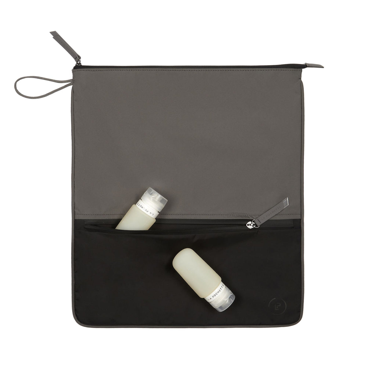 Pewter Ink Sweat Bag, shown flat and with two La Pochette silicone travel bottles resting on top and in front pocket