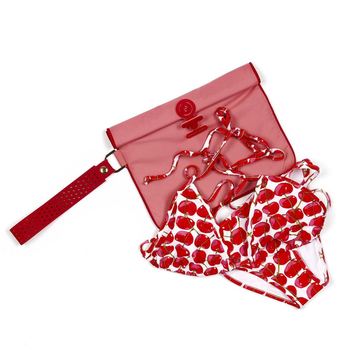 Small Wet Bag in Peony and Chilli colourway shown flat with a bikini placed on top