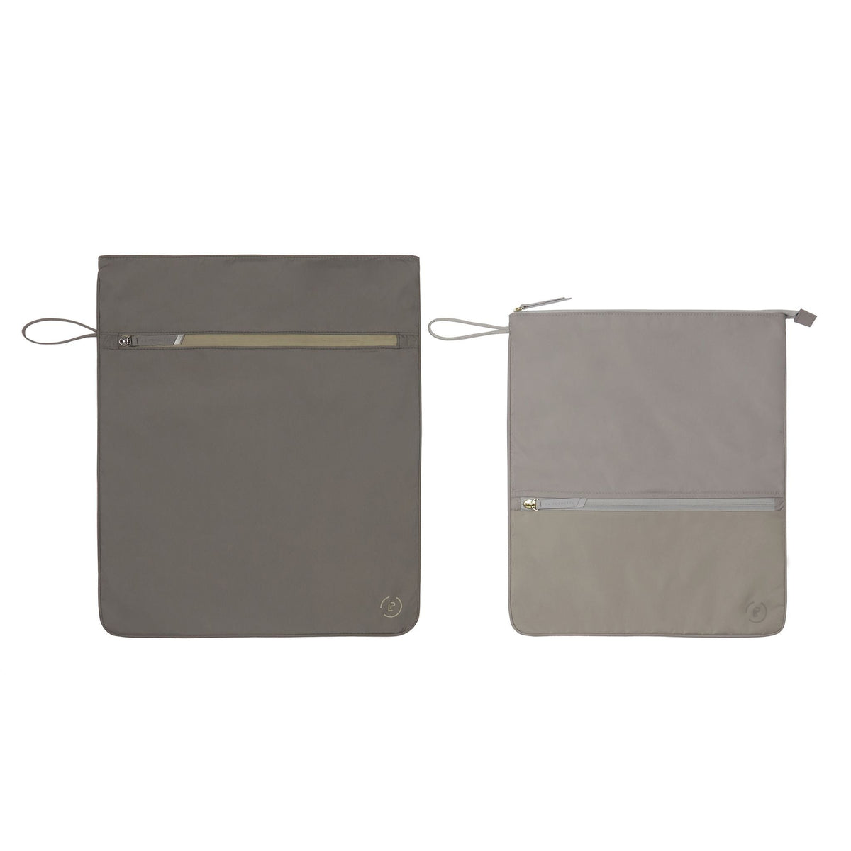 Taupe Kit Bag with smaller beige and taupe Sweat Bag side by side, showing the size comparison 
