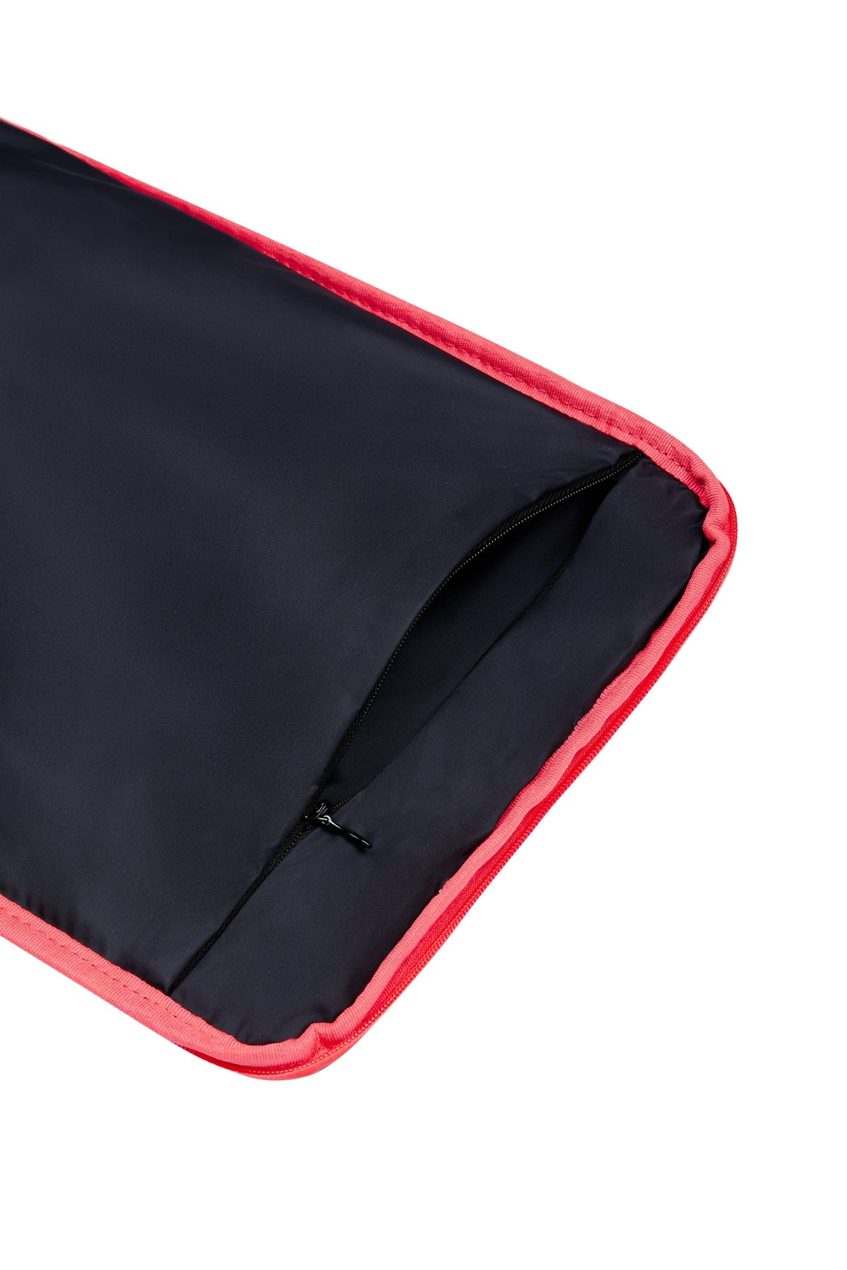 Close-up of the La Pochette Shoe Bag in navy and neon pink showing water-resistant fabric and interior zip construction